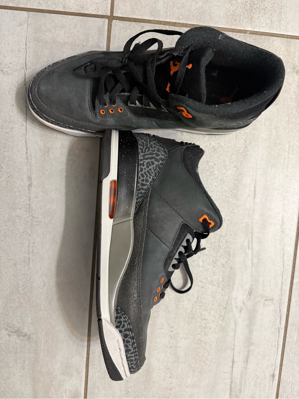 Jordan Men’s Black Sneakers with Orange Accents
